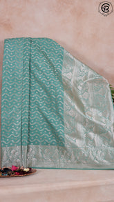 Teal Green Zari Curved Line Pattern Silk Saree